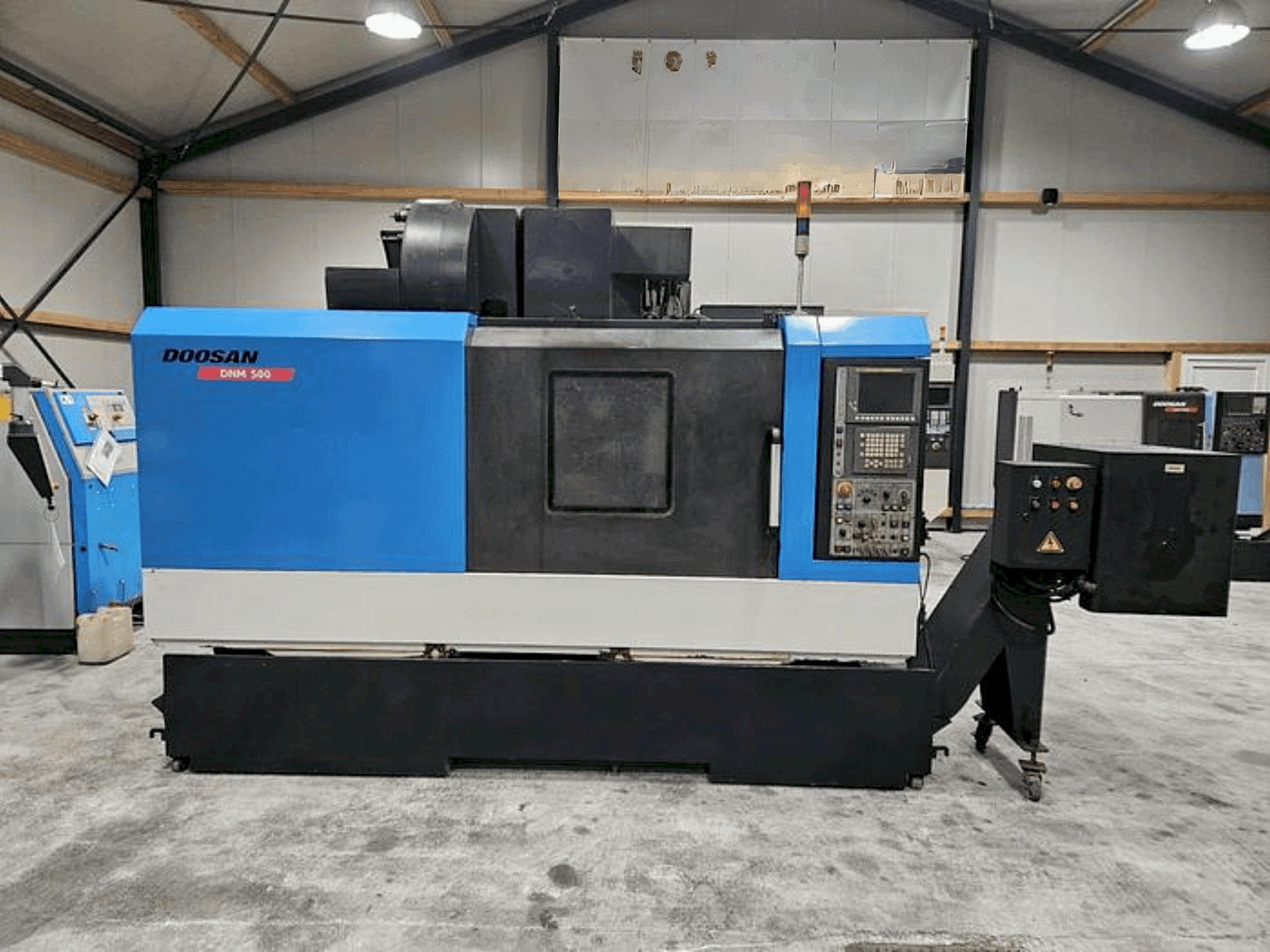 Masina DOOSAN DNM 500   eestvaade